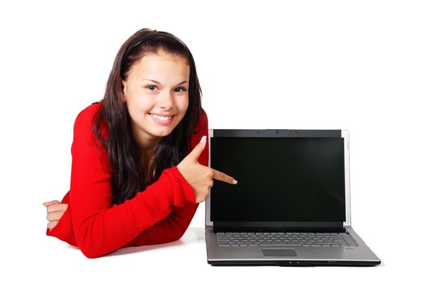 Girl with computer stock photo example
